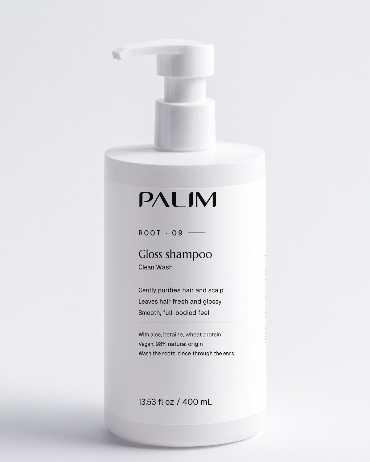 Clean Wash gloss shampoo in its white PALIM pump bottle