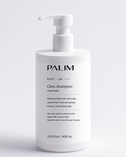 Clean Wash gloss shampoo in its white PALIM pump bottle
